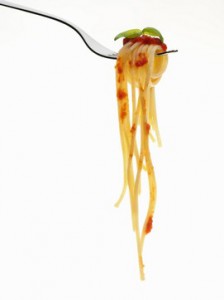 Pasta coiled on fork